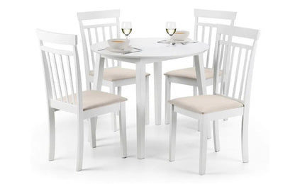 The Coast Drop Leaf 4 Seater Dining Table with two folding leaves allowing you to adapt it for everyday use or entertaining. Finished in a pristine white lacquer. H75 x L55/90 x W90 cm. Available at www.nobleandnook.co.uk