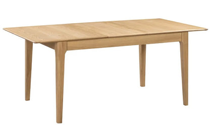 The Cotswold Extending Dining Table, crafted from solid oak and oak veneers, making it a standout piece for both classic and contemporary interiors. Ideal for family dining or entertaining guests
