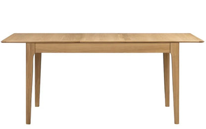 The Cotswold Extending Dining Table, crafted from solid oak and oak veneers, making it a standout piece for both classic and contemporary interiors. Ideal for family dining or entertaining guests