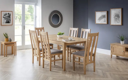 The Cotswold Extending Dining Table, crafted from solid oak and oak veneers, making it a standout piece for both classic and contemporary interiors. Ideal for family dining or entertaining guests