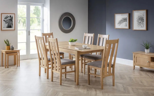 The Cotswold Extending Dining Table, crafted from solid oak and oak veneers, making it a standout piece for both classic and contemporary interiors. Ideal for family dining or entertaining guests