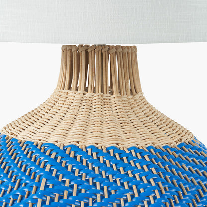 Elevate your home décor with the Brera Large Rattan Table Lamp in Cobalt, a vibrant and textural statement piece crafted in partnership with Designers Guild. Shop online today at www.nobleandnook.co.uk