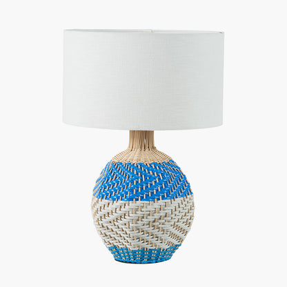 Elevate your home décor with the Brera Small Rattan Table Lamp in Cobalt, a vibrant and textural statement piece crafted in partnership with Designers Guild. Shop online today at www.nobleandnook.co.uk