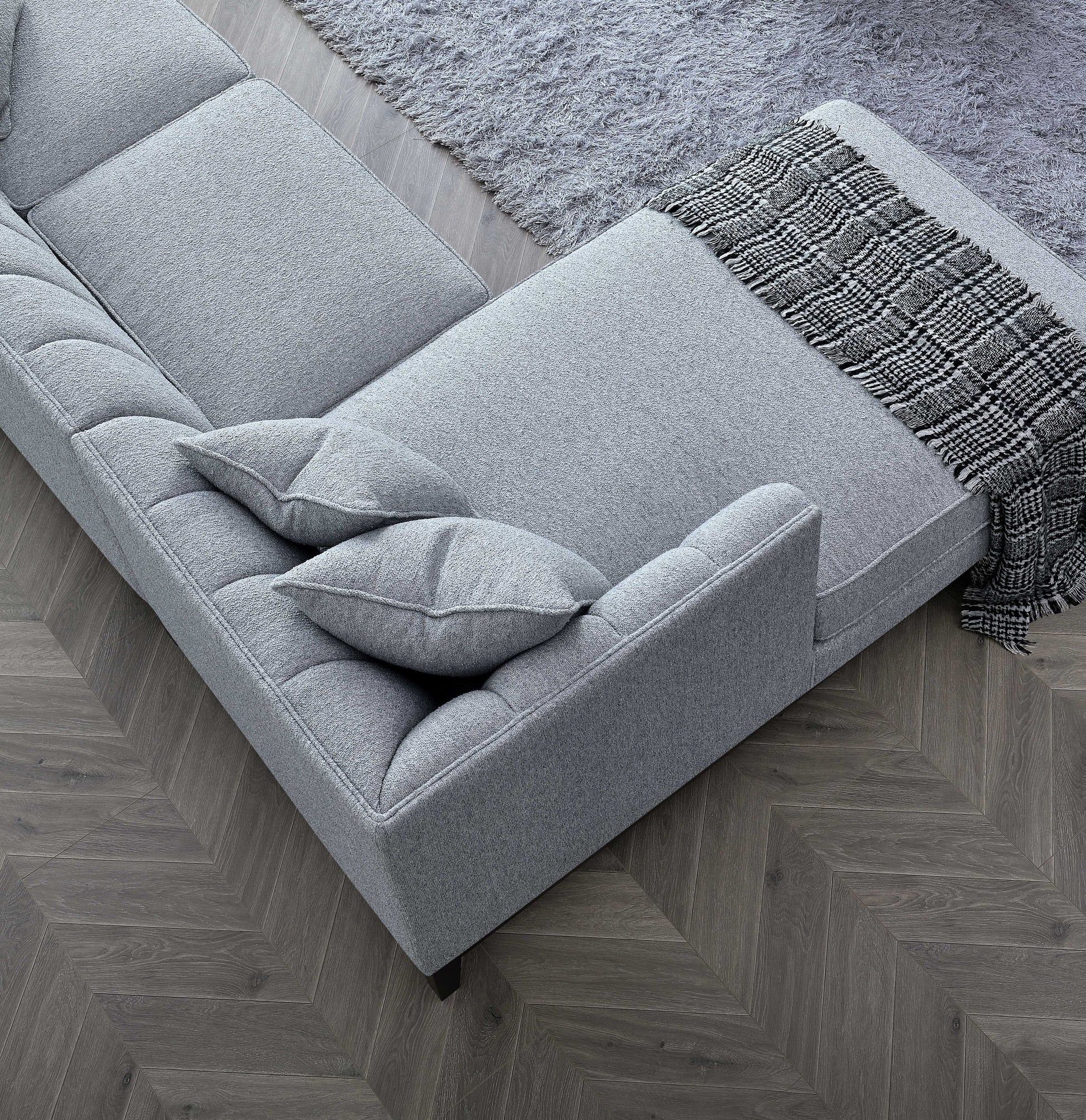 Shop the Cooper Left Hand Corner Group, showcasing the perfect blend of mid-century comfort and design. This timeless design and modern sofa boasts squared edges, sleek lines, and a minimalist silhouette. Shop online now at www.nobleandnook.co.uk
