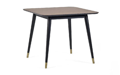 Retro-Inspired Design, combined with mid-century style with modern detailing for a timeless dining centrepiece. Walnut Finish with Brass-Tipped Black Legs. H75xL90xW90cm. www.nobleandnook.co.uk