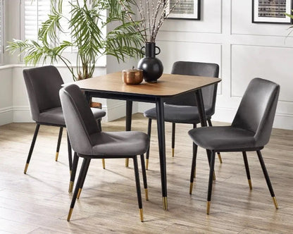 Retro-Inspired Design, combined with mid-century style with modern detailing for a timeless dining centrepiece. Walnut Finish with Brass-Tipped Black Legs. H75xL90xW90cm. www.nobleandnook.co.uk
