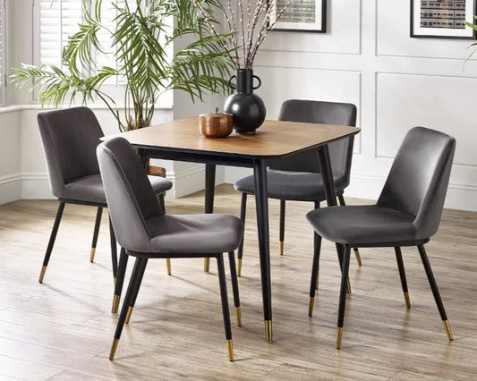 Retro-Inspired Design, combined with mid-century style with modern detailing for a timeless dining centrepiece. Walnut Finish with Brass-Tipped Black Legs. H75xL90xW90cm. www.nobleandnook.co.uk