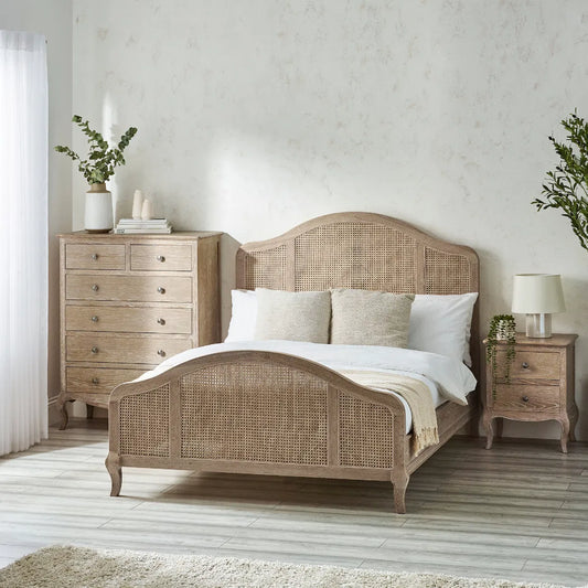 Shop the Château Rattan Bed in Light Oak, featuring an arched headboard and footboard with intricate rattan panelling. Free UK Mainland Delivery. Shop online today at www.nobleandnook.co.uk