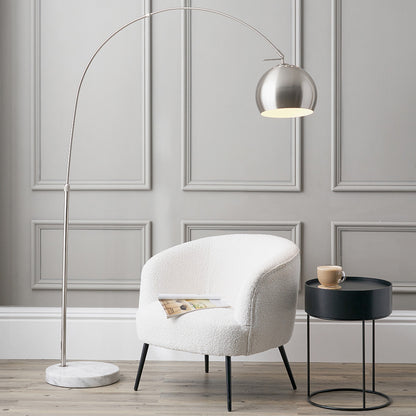 This exquisite floor lamp boasts a brushed silver finish and a solid white marble base, exuding sleek sophistication. FREE UK MAINLAND DELIVERY. Shop online now at www.nobleandnook.co.uk
