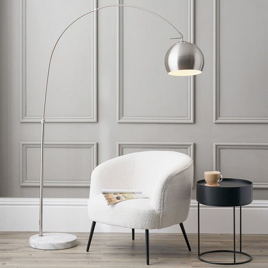 This exquisite floor lamp boasts a brushed silver finish and a solid white marble base, exuding sleek sophistication. FREE UK MAINLAND DELIVERY. Shop online now at www.nobleandnook.co.uk