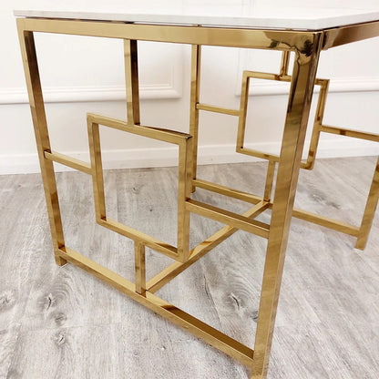 Modern Art Deco Styling – Gold Lamp Table with Polar White Sintered Top – a contemporary piece that blends bold design with practical use. W55xD55xH55cm. Shop online today at www.nobleandnook.co.uk
