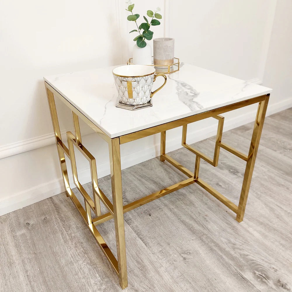 Modern Art Deco Styling – Gold Lamp Table with Polar White Sintered Top – a contemporary piece that blends bold design with practical use. W55xD55xH55cm. Shop online today at www.nobleandnook.co.uk