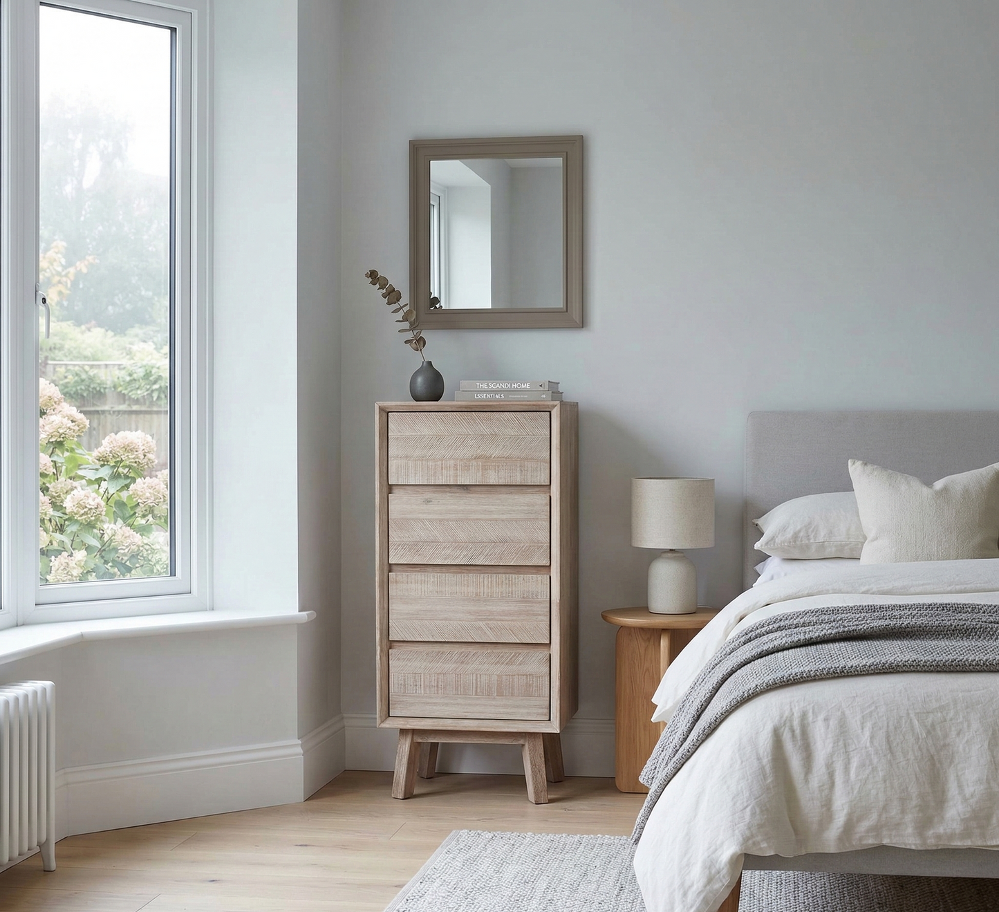 Neatly arranged bedroom with a tall wooden dresser, bed, and window.