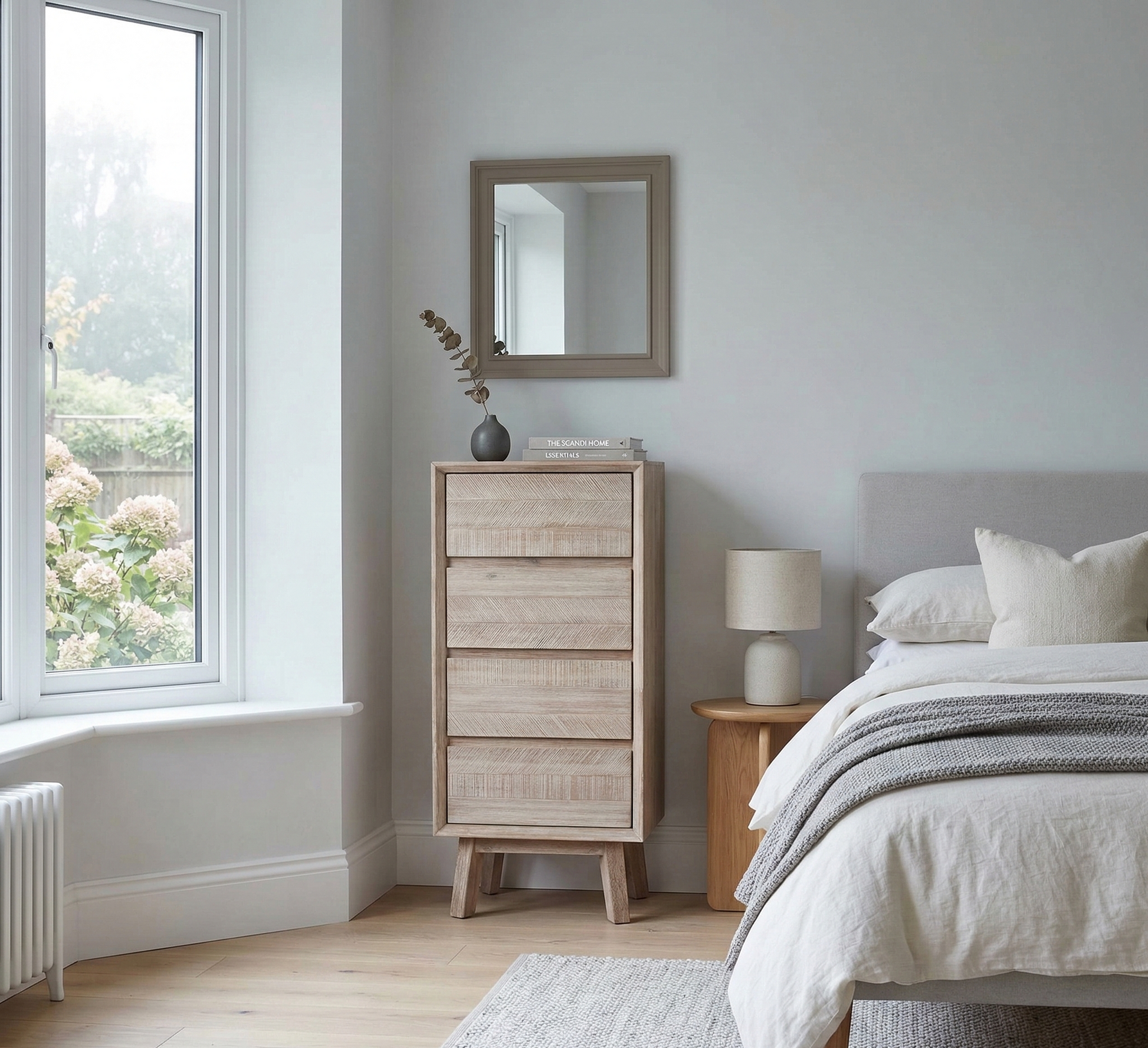 Neatly arranged bedroom with a tall wooden dresser, bed, and window.