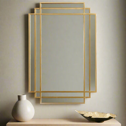 Shop this Gold Metal Art Deco Rectangular Wall Mirror, a timeless and elegant addition to your wall. FREE UK MAINLAND DELIVERY. Shop online now at www.nobleandnook.co.uk