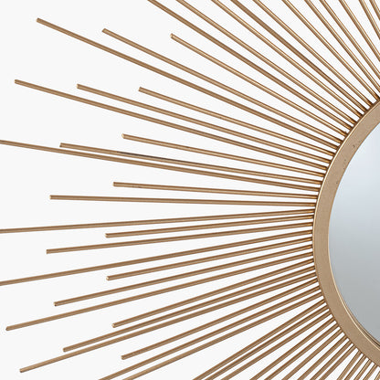 Shop Now and add a touch of daring to your home with this flamboyant Gold Metal Starburst Design Round Wall Mirror. Shop online now at www.nobleandnook.co.uk