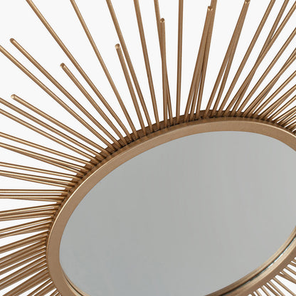 Shop Now and add a touch of daring to your home with this flamboyant Gold Metal Starburst Design Round Wall Mirror. Shop online now at www.nobleandnook.co.uk