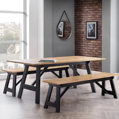 Shop the Hockley Dining Bench in Black/Oak a stylish and practical addition to your dining space. Crafted with a solid rubberwood top and a black painted trestle base. Shop online now at www.nobleandnook.co.uk