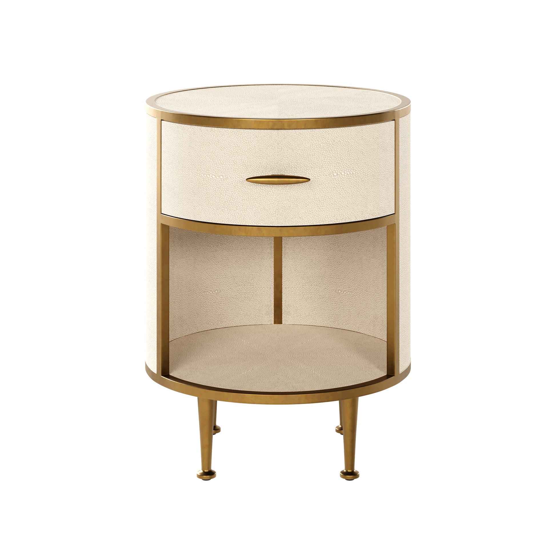 The Hampton Bedside Table features a sleek round design with a single drawer, crafted in ivory faux shagreen and brass accents. Shop online now at www.nobleandnook.co.uk