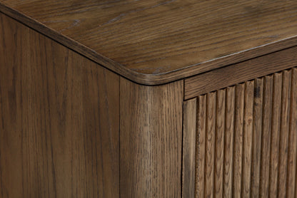 Shop the Abberley TV Unit. Crafted in dark stained brown oak, visible grain and ribbed design to add a touch of sophistication. Shop online today at www.nobleandnook.co.uk