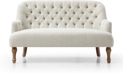 Shop the Bianca 2-Seater Chair, combining classic elegance with superior comfort. Featuring a plump seat, eye-catching tufted back, and traditional washed wooden legs. Shop online at www.nobleandnook.co.uk