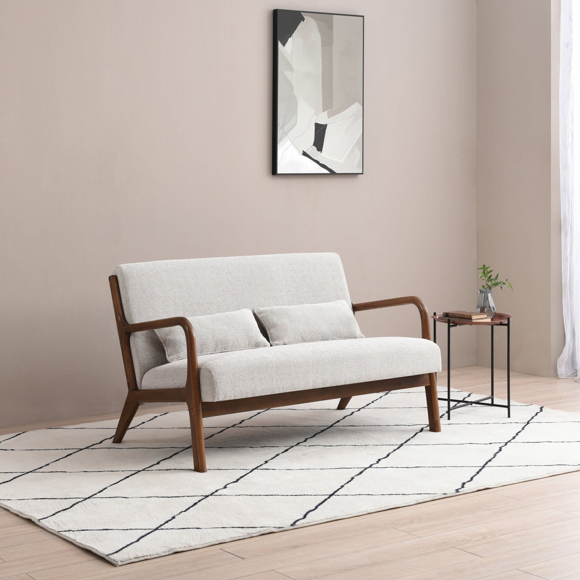 The Inca 2 Seater upholstered in soft Natural Woven Chenille fabric, an elegantly designed sofa featuring a padded back, seat, and bolster cushion, ensuring exceptional comfort. Shop online today at www.nobleandnook.co.uk