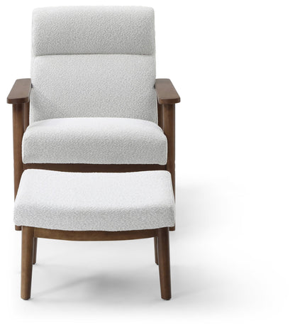 Ultimate comfort and timeless elegance, the Isaac Chair & Footstool, upholstered in luxurious natural bouclé, brings style and warmth to any space. Shop online today at www.nobleandnook.co.uk