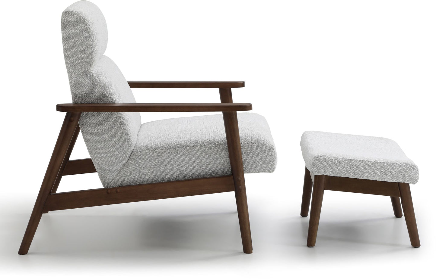 Ultimate comfort and timeless elegance, the Isaac Chair & Footstool, upholstered in luxurious natural bouclé, brings style and warmth to any space. Shop online today at www.nobleandnook.co.uk