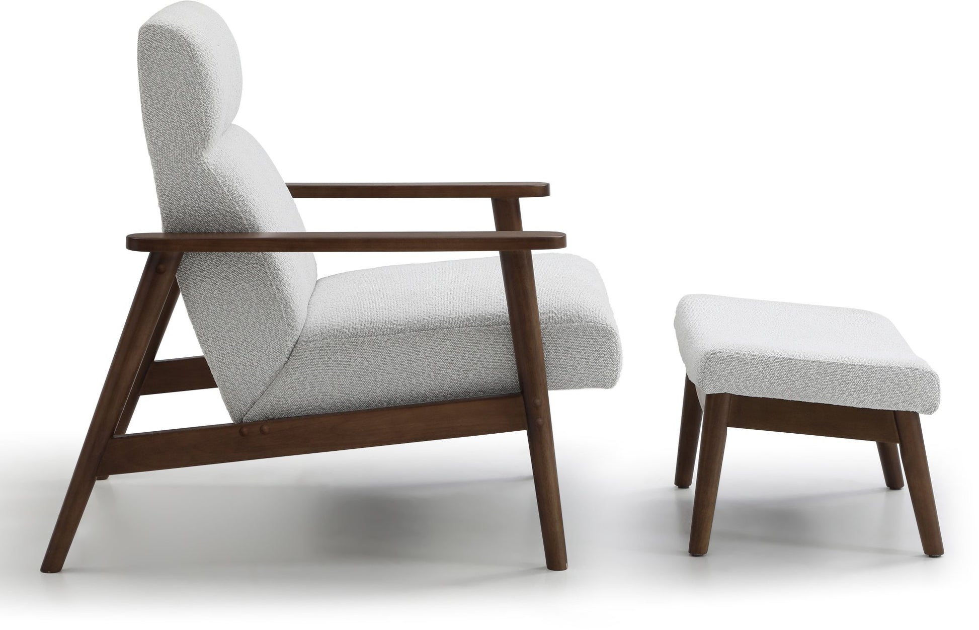 Ultimate comfort and timeless elegance, the Isaac Chair & Footstool, upholstered in luxurious natural bouclé, brings style and warmth to any space. Shop online today at www.nobleandnook.co.uk