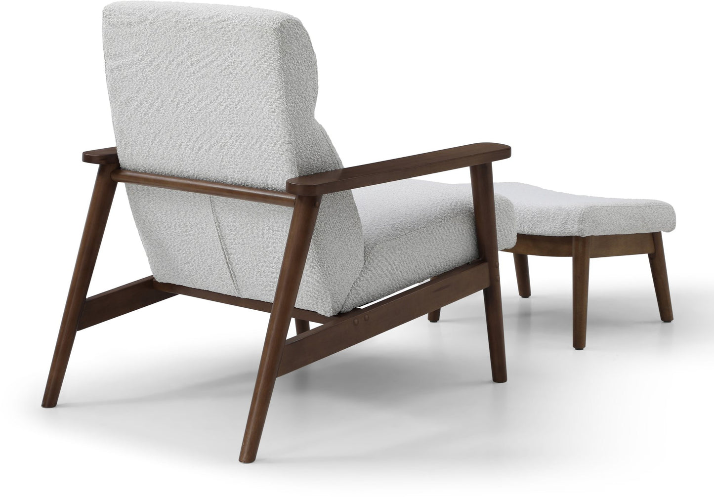 Ultimate comfort and timeless elegance, the Isaac Chair & Footstool, upholstered in luxurious natural bouclé, brings style and warmth to any space. Shop online today at www.nobleandnook.co.uk