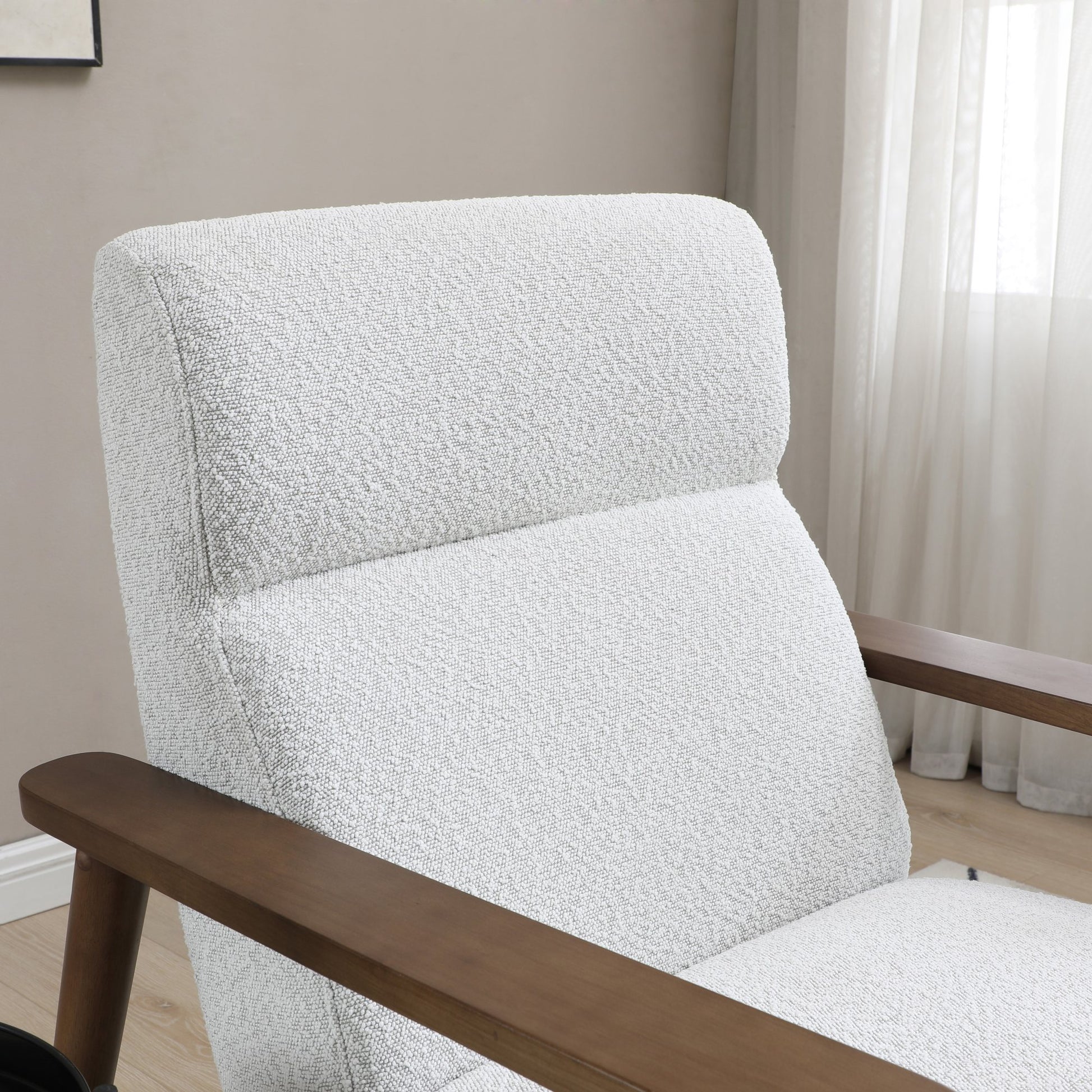 Ultimate comfort and timeless elegance, the Isaac Chair & Footstool, upholstered in luxurious natural bouclé, brings style and warmth to any space. Shop online today at www.nobleandnook.co.uk