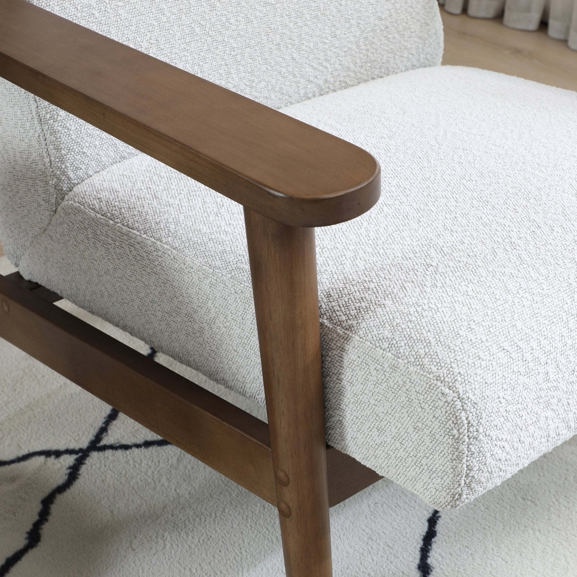 Ultimate comfort and timeless elegance, the Isaac Chair & Footstool, upholstered in luxurious natural bouclé, brings style and warmth to any space. Shop online today at www.nobleandnook.co.uk
