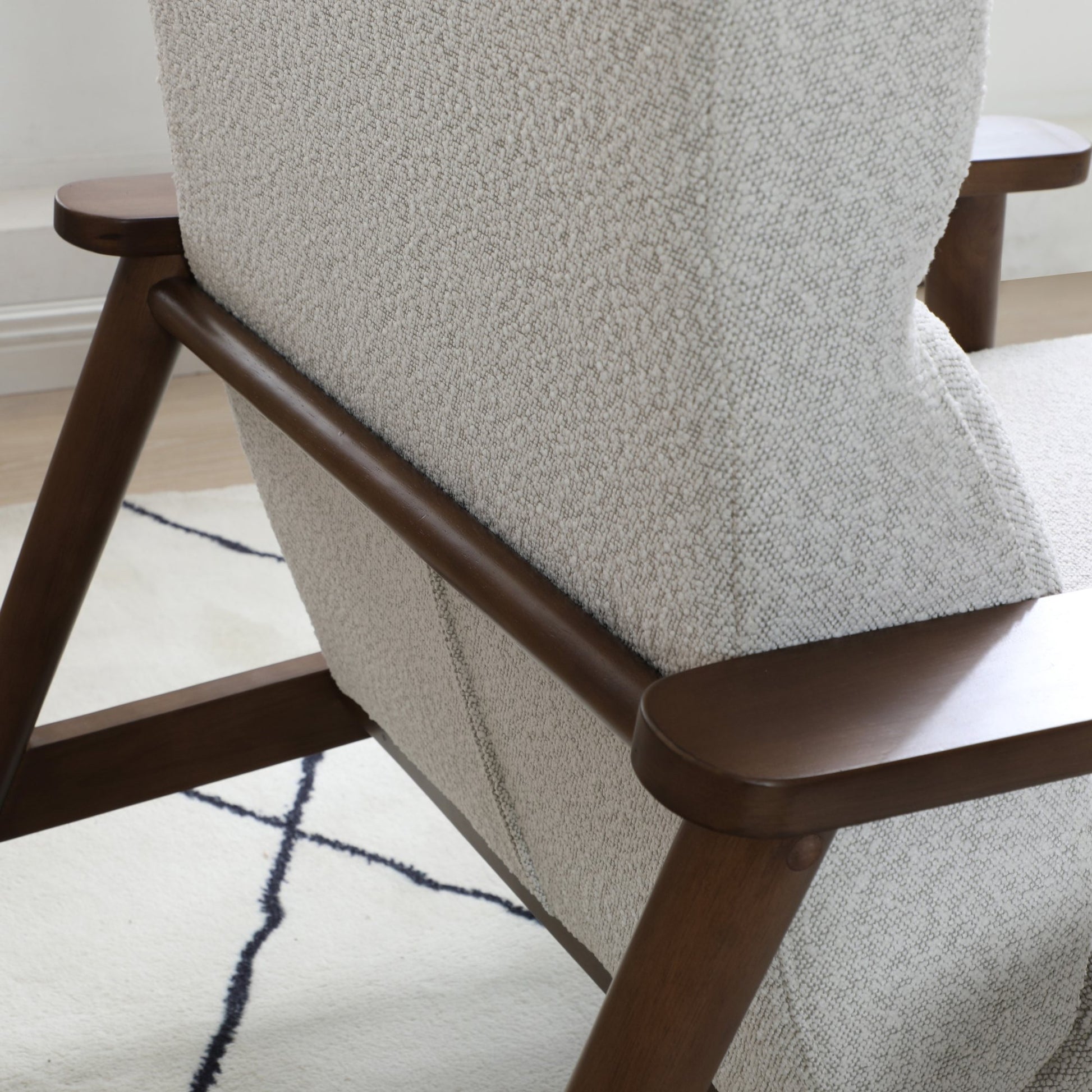 Ultimate comfort and timeless elegance, the Isaac Chair & Footstool, upholstered in luxurious natural bouclé, brings style and warmth to any space. Shop online today at www.nobleandnook.co.uk