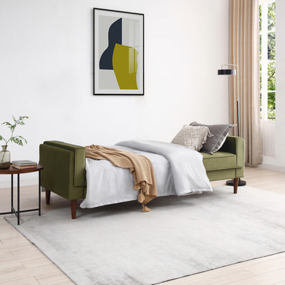 Shop the Paolo Sofa Bed in Olive Green Velvet, a versatile piece that transitions effortlessly from a comfortable sofa to a practical bed, perfect for guests or compact living spaces. Shop online today at www.nobleandnook.co.uk