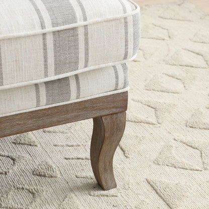 The Colwell Chair is a best-selling classic. Featuring gracefully curved wooden arms and legs, this armchair embodies timeless craftsmanship. Shop online today at www.nobleandnook.co.uk