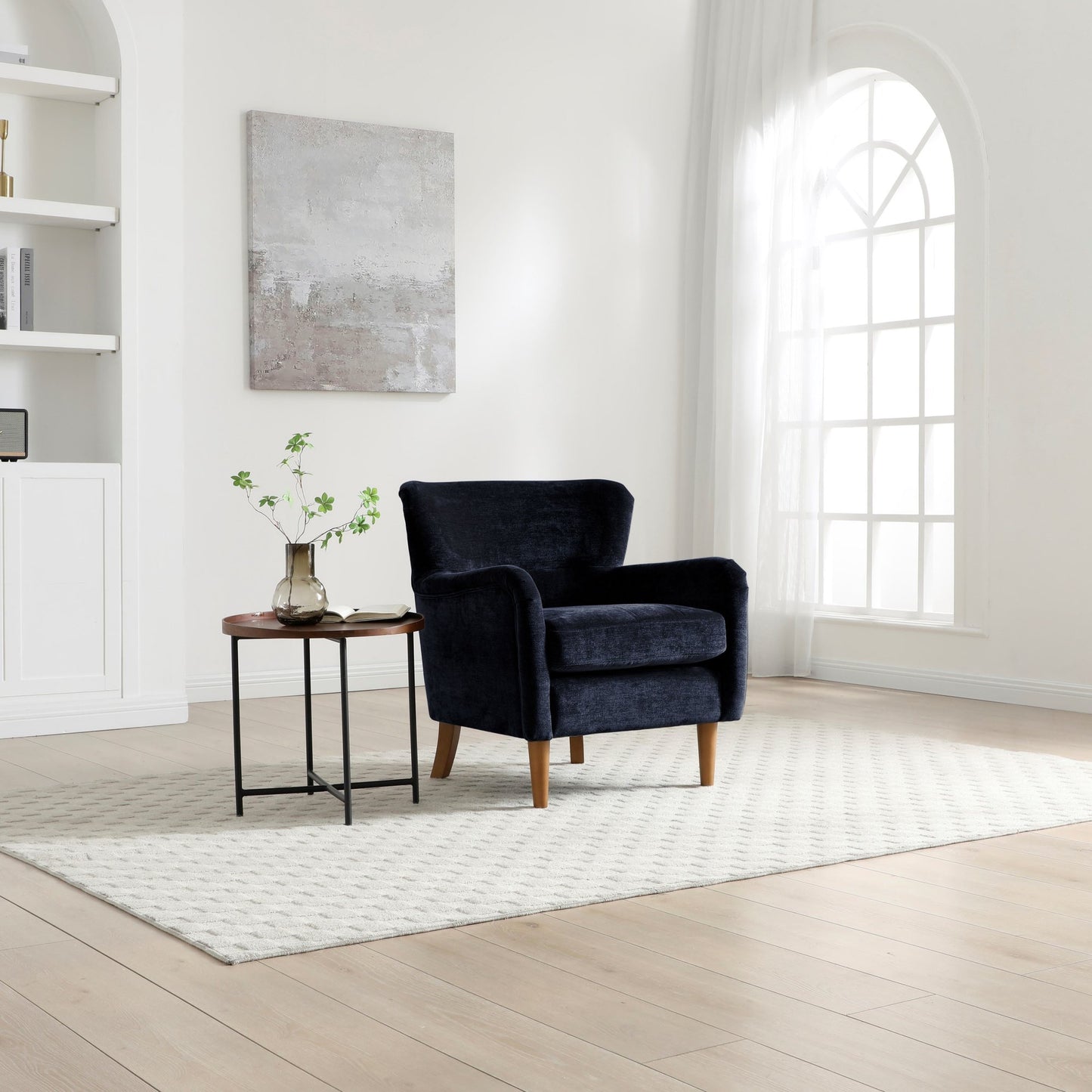 Wingback Inspired Design with an elegant silhouette with gently curved arms for a timeless look. Premium Upholstery, finished in rich Navy Luxe Chenille for a soft, luxurious feel. www.nobleandnook.co.uk
