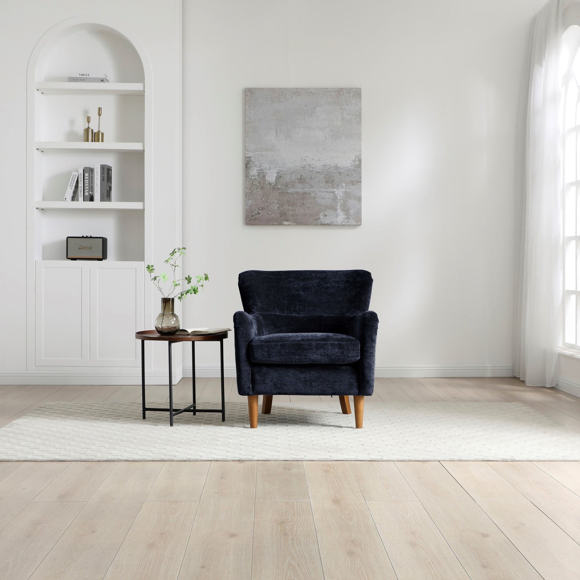 Wingback Inspired Design with an elegant silhouette with gently curved arms for a timeless look. Premium Upholstery, finished in rich Navy Luxe Chenille for a soft, luxurious feel. www.nobleandnook.co.uk
