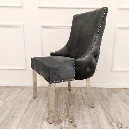 Elevate your dining experience with this exquisite pair of Kensington Velvet Dining Chairs in Dark Grey. Perfect for modern and classic interiors alike. Shop online today at www.nobleandnook.co.uk