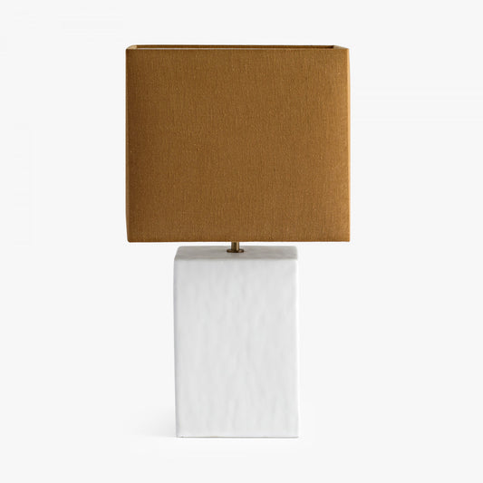 Small Rectangular Gesso Lamp with sculptural rectangular base. Perfect for smaller spaces, this lamp delivers ambient light while serving as a modern accent in any room. W31 x D31 x H55 cm Shop online now at www.nobleandnook.co.uk