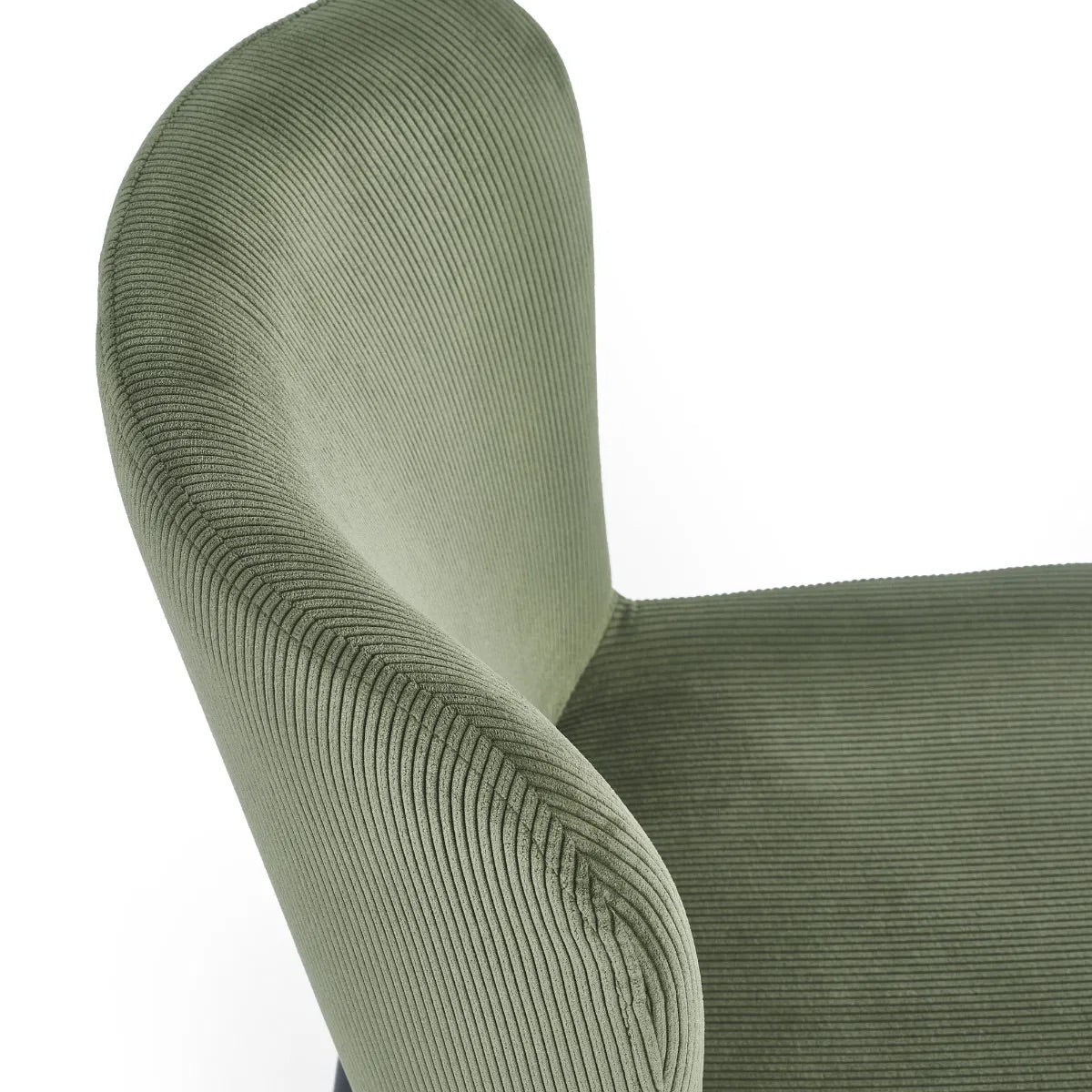 Shop the Leonie Dining Chair in green velvet and bring a sophisticated statement to your dining space. Featuring a plush, curved design and slender black legs. Shop online today at www.nobleandnook.co.uk