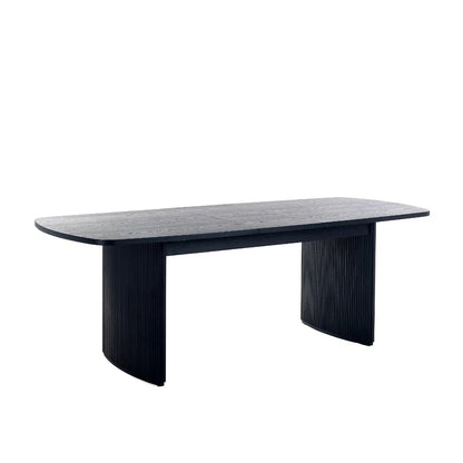 Elevate your dining area with the Louis Fluted Extending Dining Table, a modern masterpiece finished in luxurious matt black. Adjusts from W180cm to W220cm to seat 6 people comfortably. Shop online today at www.nobleandnook.co.uk