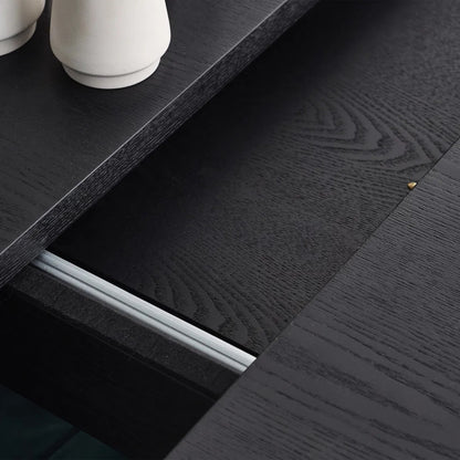 Elevate your dining area with the Louis Fluted Extending Dining Table, a modern masterpiece finished in luxurious matt black. Adjusts from W180cm to W220cm to seat 6 people comfortably. Shop online today at www.nobleandnook.co.uk