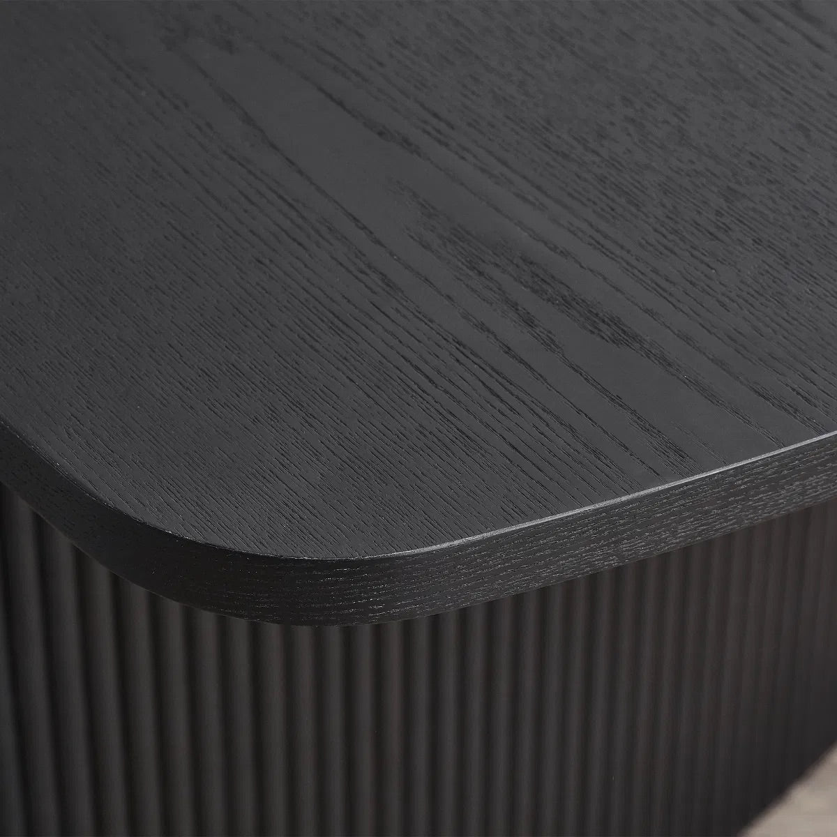 Elevate your dining area with the Louis Fluted Extending Dining Table, a modern masterpiece finished in luxurious matt black. Adjusts from W180cm to W220cm to seat 6 people comfortably. Shop online today at www.nobleandnook.co.uk
