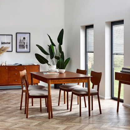 Bring timeless charm and functionality to your dining space with the Lowry Extending Dining Table with 2 Drawers in luxurious cherry ash wood and veneer. H78xD90xW180 cm Shop online today at www.nobleandnook.co.uk