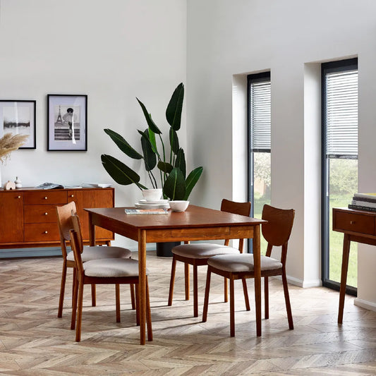 Bring timeless charm and functionality to your dining space with the Lowry Extending Dining Table with 2 Drawers in luxurious cherry ash wood and veneer. H78xD90xW180 cm Shop online today at www.nobleandnook.co.uk
