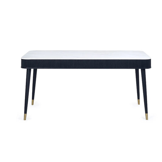 Shop the Louis Black Fluted Stone Topped Dining Table, the epitome of modern sophistication with its marble-effect surface, dramatic black fluting, and gold accents. Dimensions W190 x D90 x H77 cm. Shop online today at www.nobleandnook.co.uk