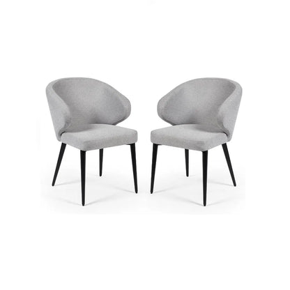 Upholstered in soft, light grey linen-effect fabric with ergonomic curved backrest and padded seat to ensure superior comfort, making them perfect for daily meals or hosting guests. www.nobleandnook.co.uk