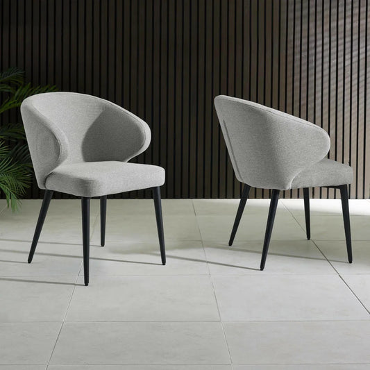 Upholstered in soft, light grey linen-effect fabric with ergonomic curved backrest and padded seat to ensure superior comfort, making them perfect for daily meals or hosting guests. www.nobleandnook.co.uk