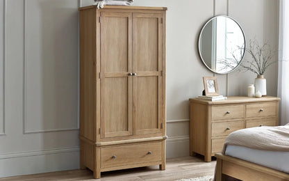 Shop the Memphis double Wardrobe with lower drawer. Finished in exquisite limed oak with gracefully curved edging, this wardrobe is a statement piece. Shop online today at www.nobleandnook.co.uk