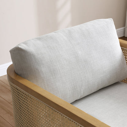 Shop the Mabel Rattan Accent Chair, a unique piece featuring a padded back and seat adorned with a bolster cushion, all resting on a stained wooden frame. Shop online now at www.nobleandnook.co.uk